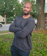 Book an Appointment with Antoine Read at Enlightened Touch